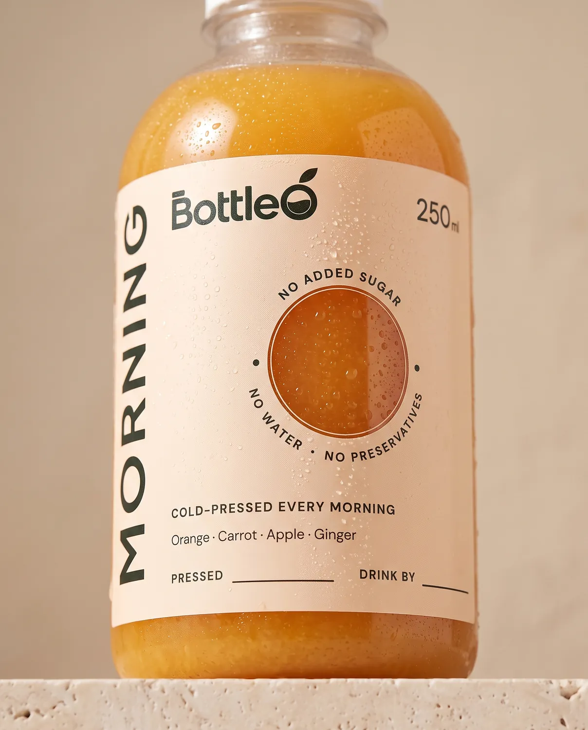 Close-up of a BottleO label with the pressed and drink-by dates